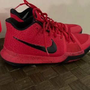 Red/Black Kyrie Irving sneakers